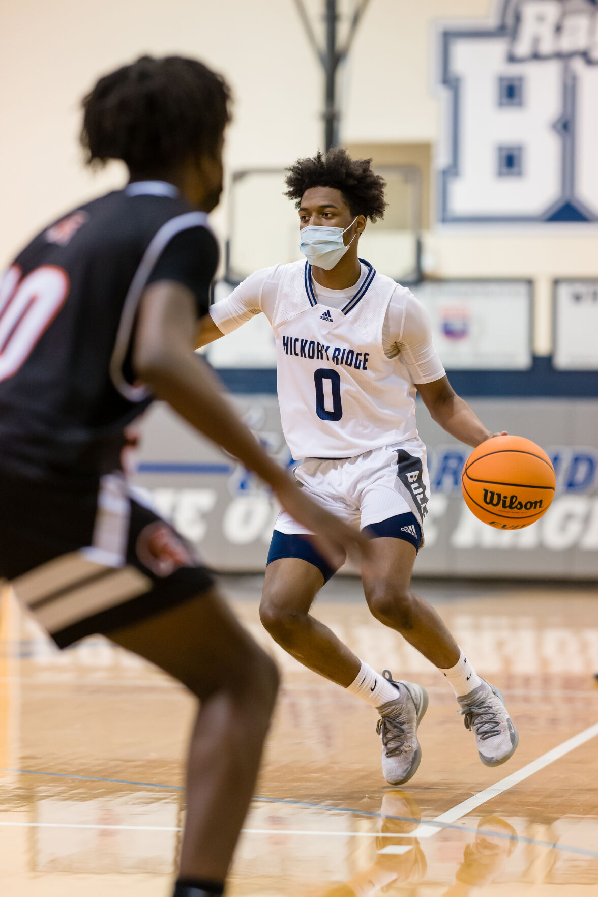 Boys Basketball: Hickory Ridge RaginÕ Bulls defeated the Northwest Cabarrus Trojans 64-56.